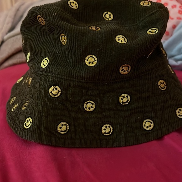 This is a smiley face bucket hat. Dark green. Super cute. Snug - Picture 2 of 2